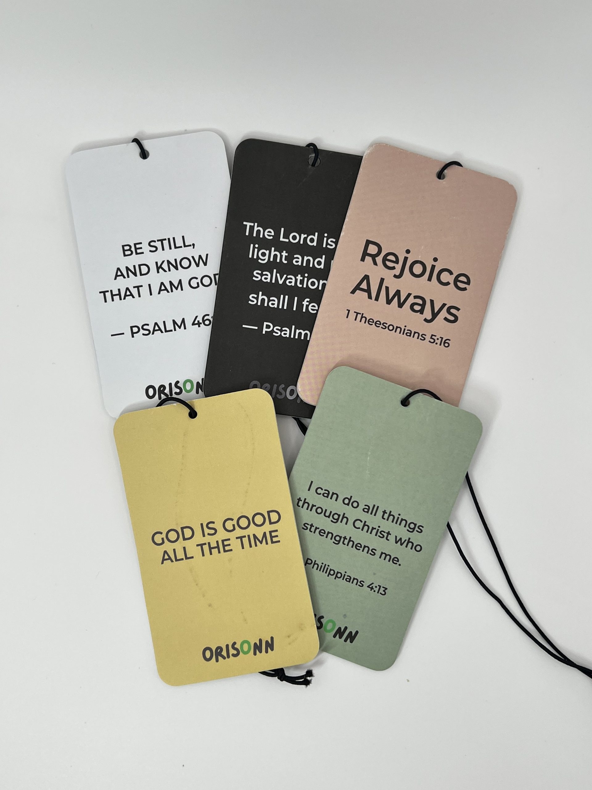 Christian Car Air Freshener Gift Set with 5 Bible Verse designs including Psalm 46:10, Psalm 27:1, Philippians 4:13, Rejoice Always, and God Is Good All The Time.